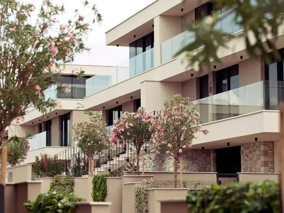 Exclusive design villa in upscale “Golf Resort” within walking distance to the sea – luxury living on four levels