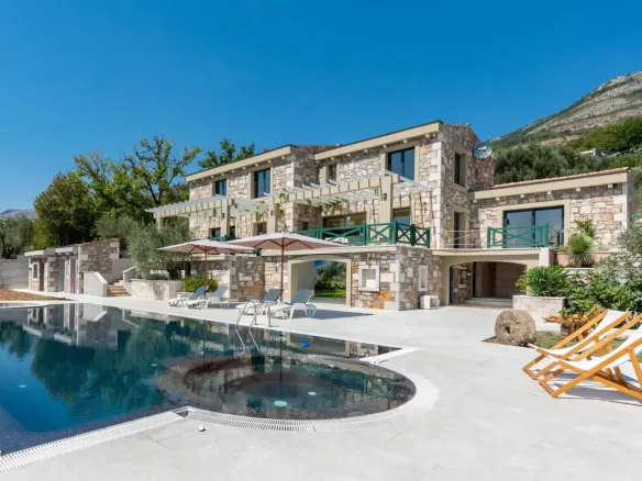 New stone villa with pool and open sea view, Buljarica