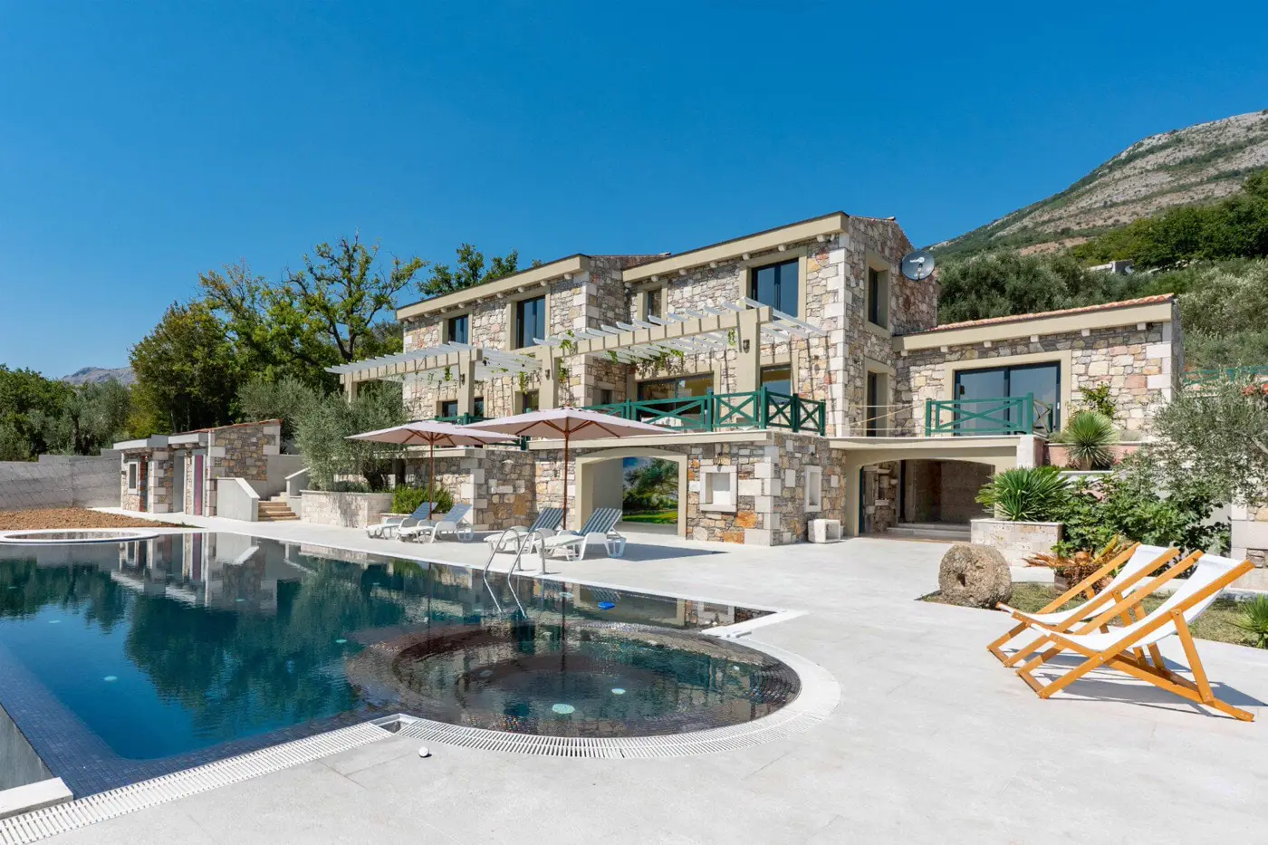 New stone villa with pool and open sea view, Buljarica
