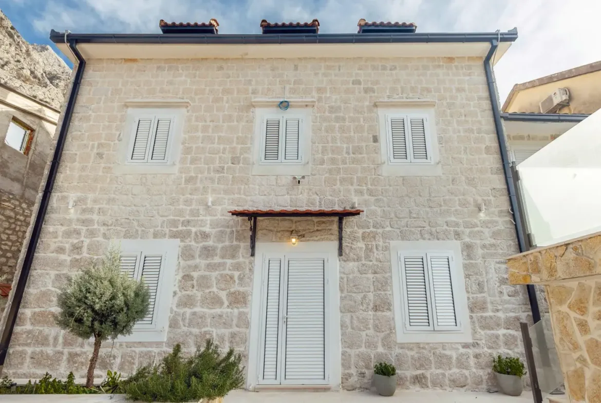 Reconstructed stone villa on the first line to the sea in Ljutoja, Kotor