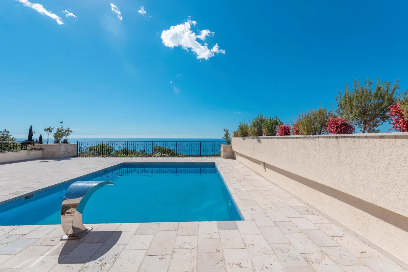 A complex of stone villas with swimming pools and a panoramic view of the sea, Budva, Reževići
