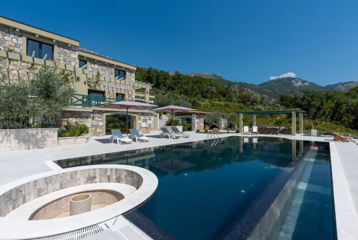 New stone villa with pool and open sea view, Buljarica