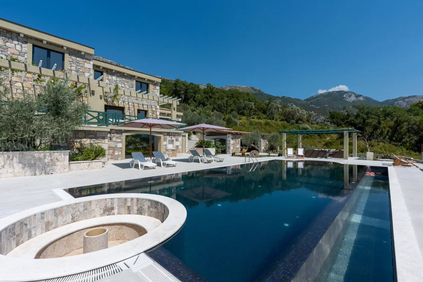 New stone villa with pool and open sea view, Buljarica