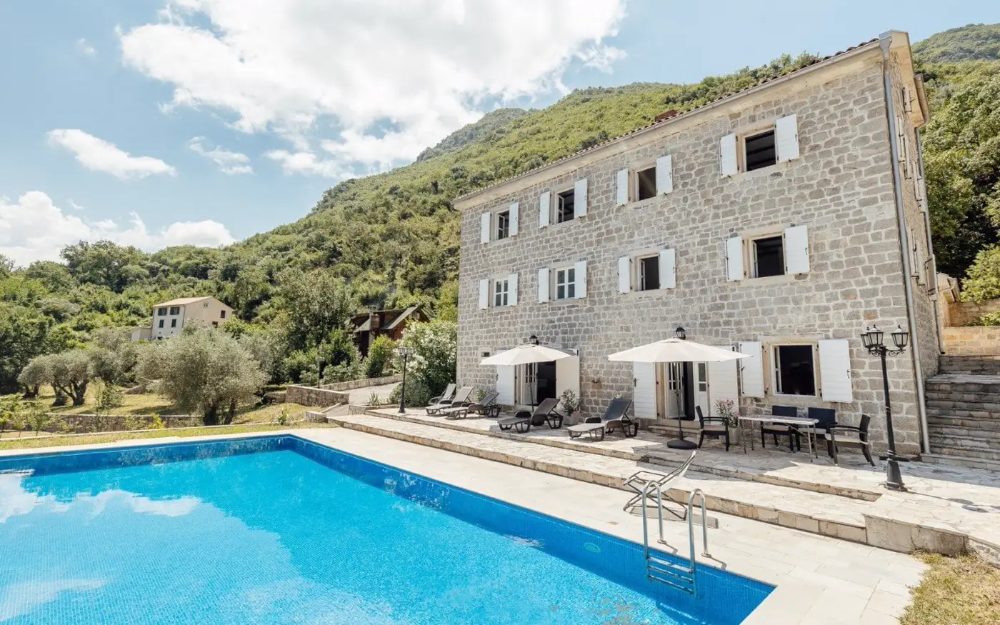Palazzo Jerovica, a complex of stone villas and houses with a pool and a view of the bay, Kotor