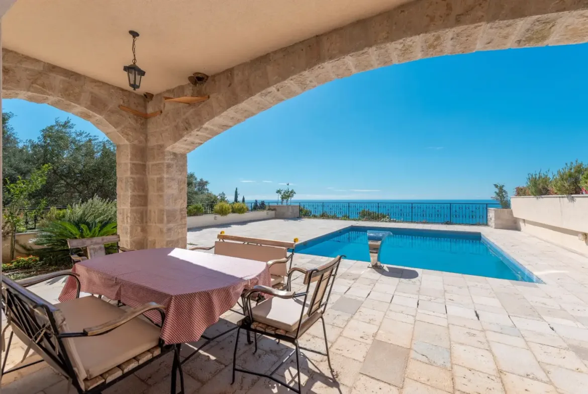 A complex of stone villas with swimming pools and a panoramic view of the sea, Budva, Reževići