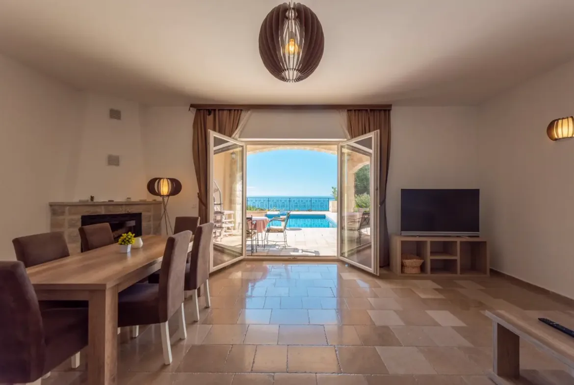 A complex of stone villas with swimming pools and a panoramic view of the sea, Budva, Reževići