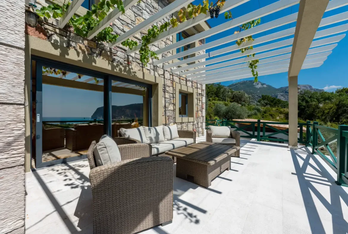 New stone villa with pool and open sea view, Buljarica