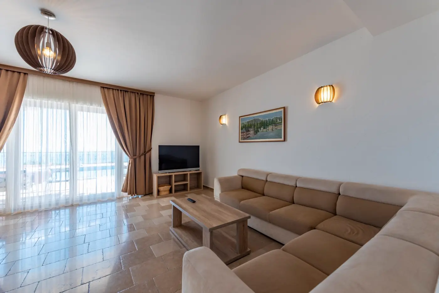 A complex of stone villas with swimming pools and a panoramic view of the sea, Budva, Reževići