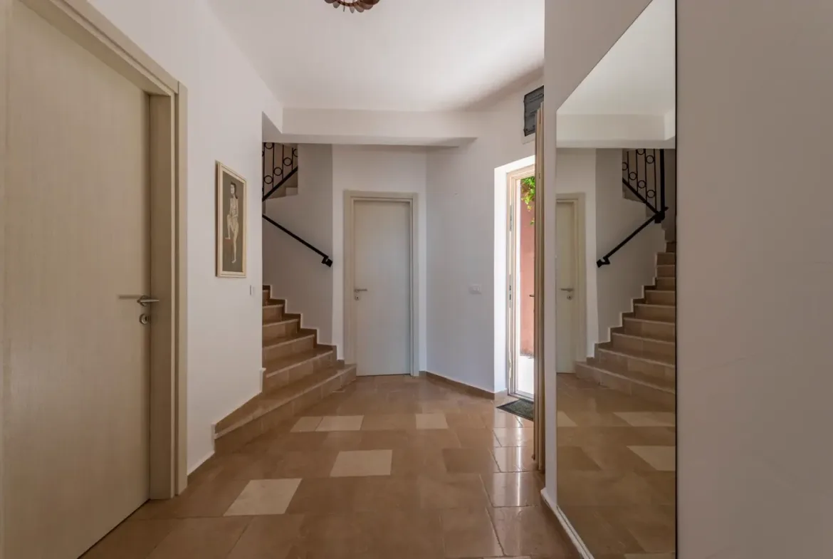 A complex of stone villas with swimming pools and a panoramic view of the sea, Budva, Reževići