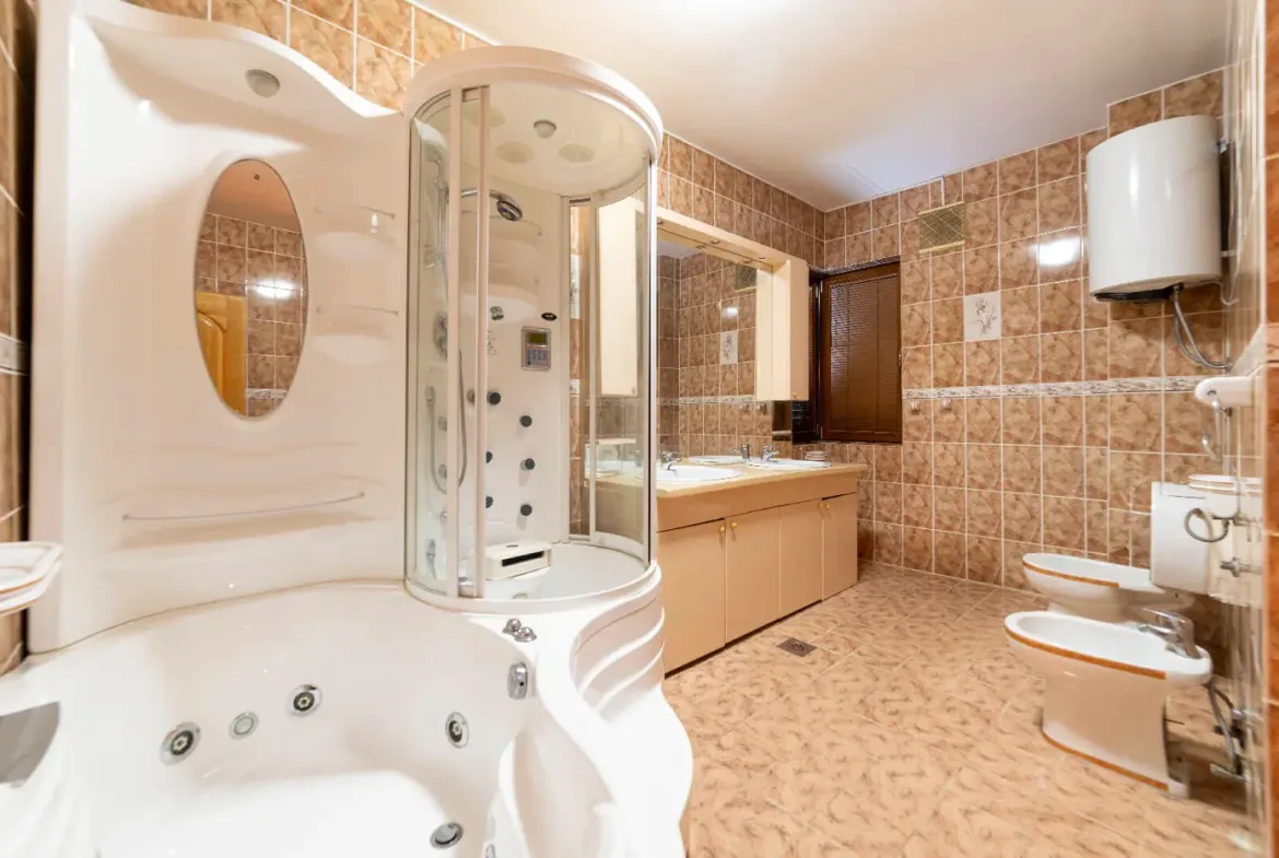 Family villa with a spacious property on the slopes of the Zeta river, Podgorica