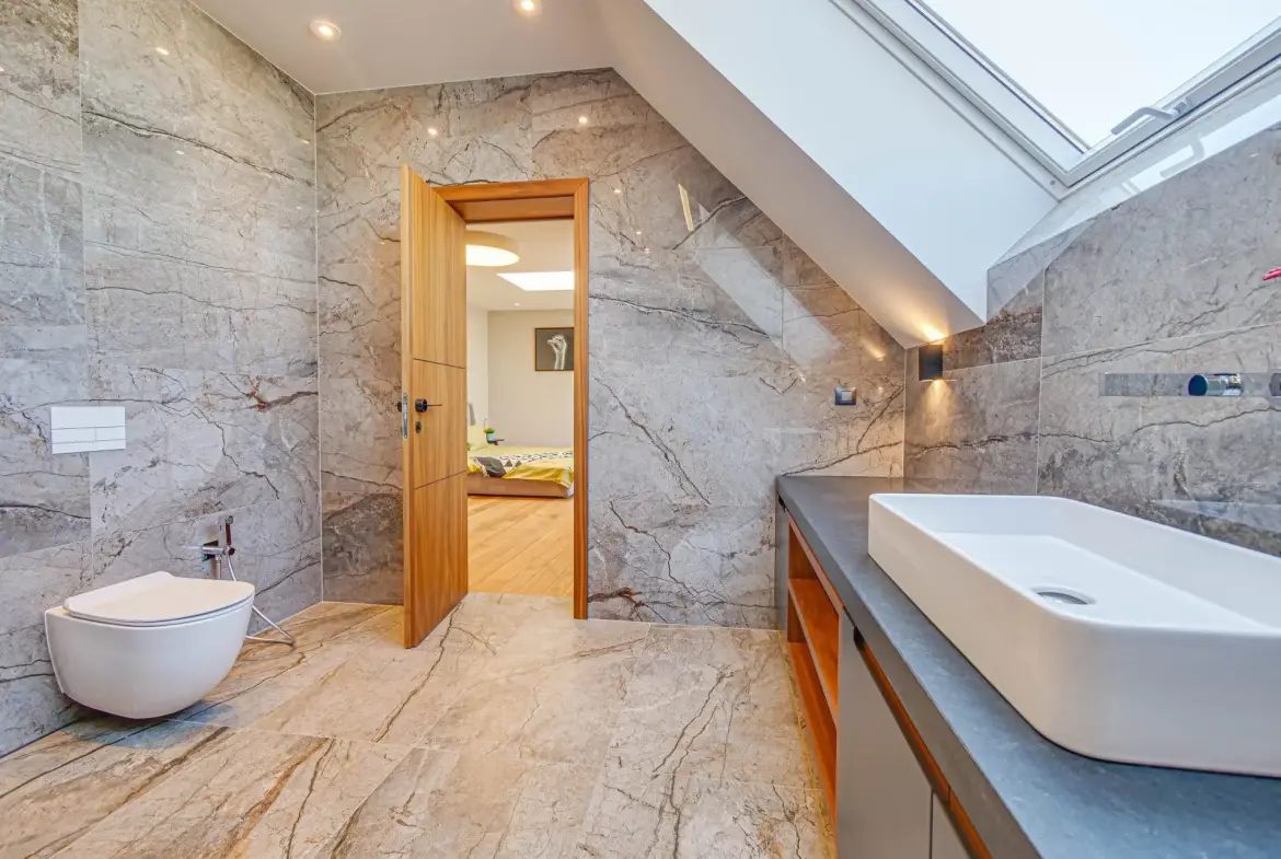 Magnificent three-bedroom apartment with a double garage in the Iztok district for sale