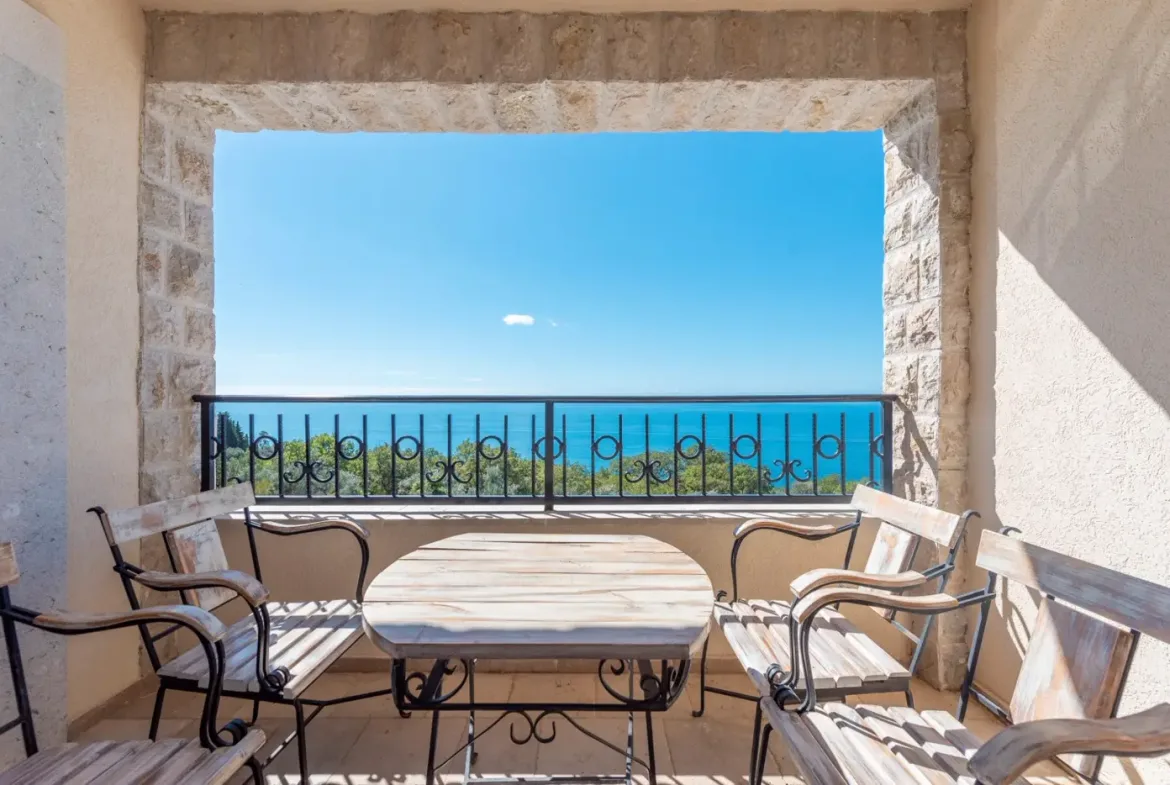 A complex of stone villas with swimming pools and a panoramic view of the sea, Budva, Reževići