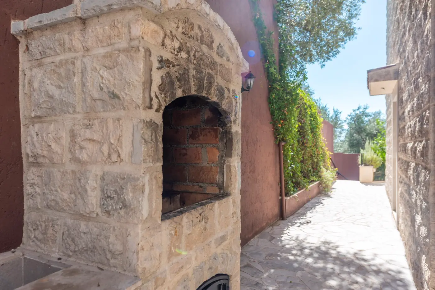 A complex of stone villas with swimming pools and a panoramic view of the sea, Budva, Reževići