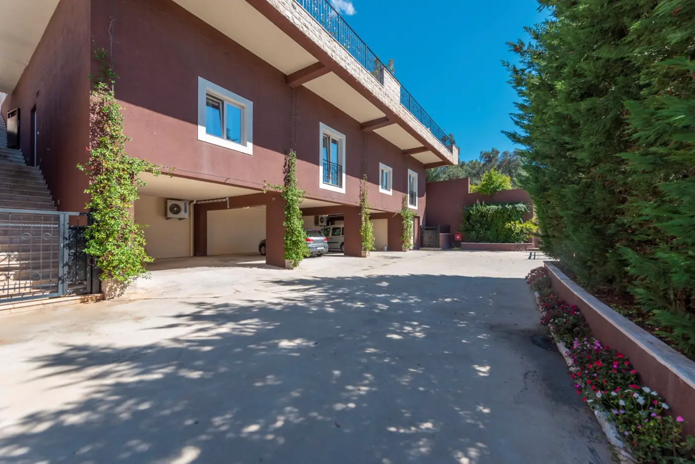 A complex of stone villas with swimming pools and a panoramic view of the sea, Budva, Reževići
