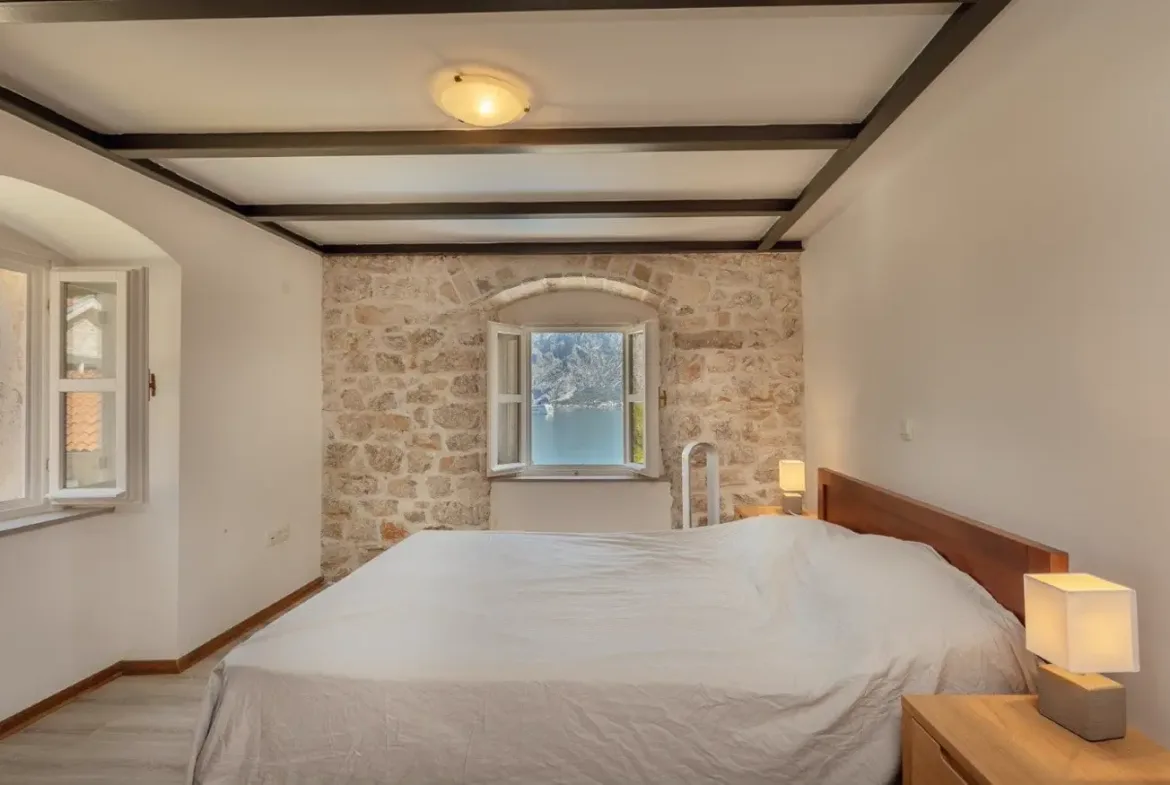 Palazzo Jerovica, a complex of stone villas and houses with a pool and a view of the bay, Kotor