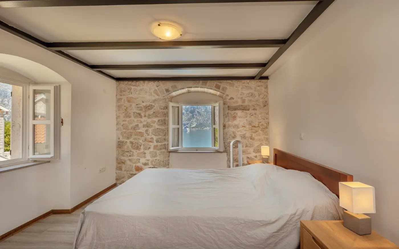 Palazzo Jerovica, a complex of stone villas and houses with a pool and a view of the bay, Kotor