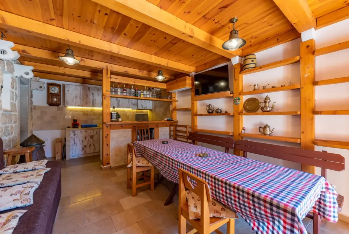 A complex of stone villas with swimming pools and a panoramic view of the sea, Budva, Reževići