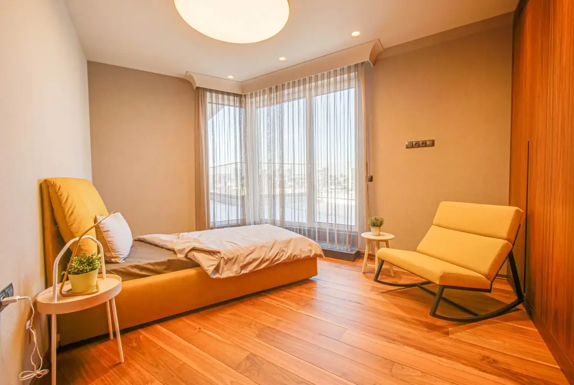 Magnificent three-bedroom apartment with a double garage in the Iztok district for sale
