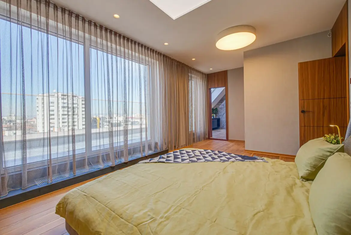 Magnificent three-bedroom apartment with a double garage in the Iztok district for sale