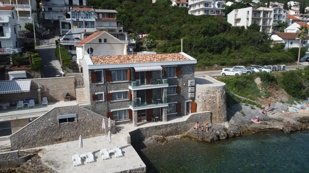 For sale seafront stone house with three apartments in Krasici