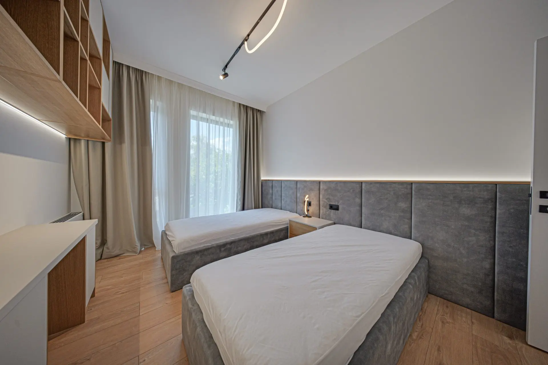 Luxurious and fully furnished two-bedroom apartment in a new gated complex for sale