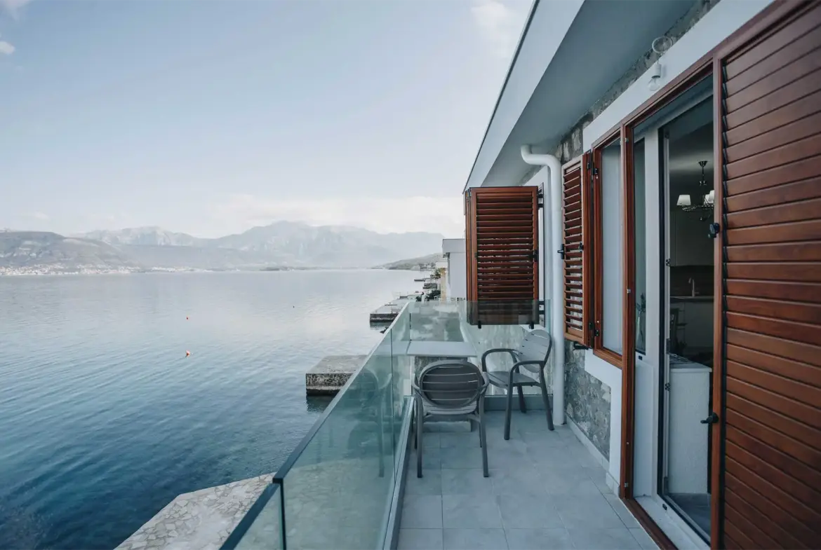 For sale seafront stone house with three apartments in Krasici