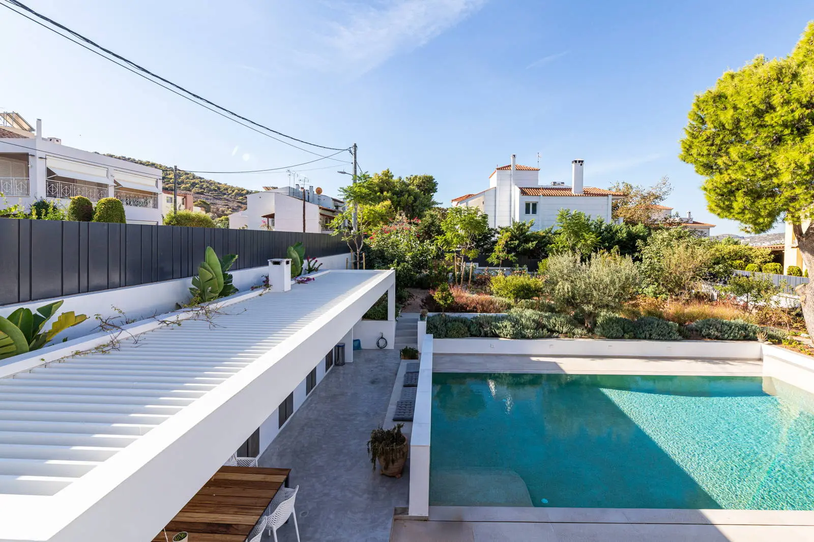 Exquisite modern villa in Vari with breathtaking paradise garden and pool