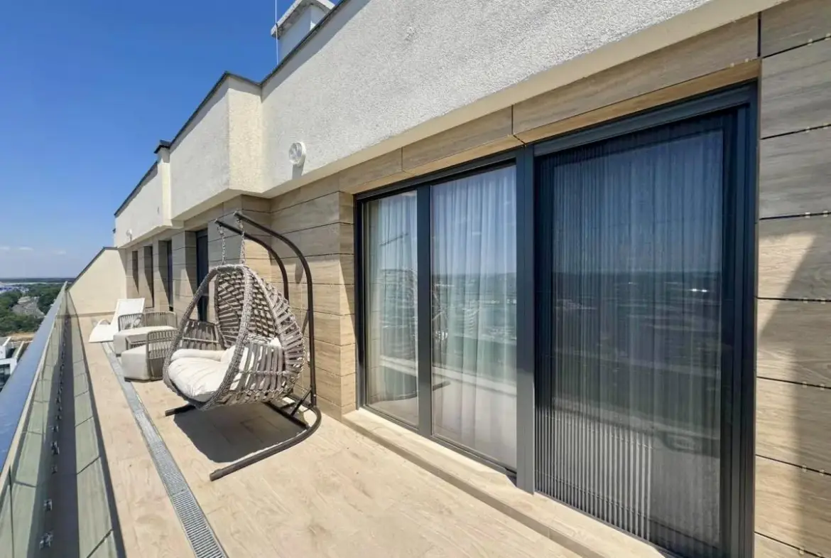 Elegant Four-Bedroom Apartment with Panoramic Views in the Wellport Residential Complex