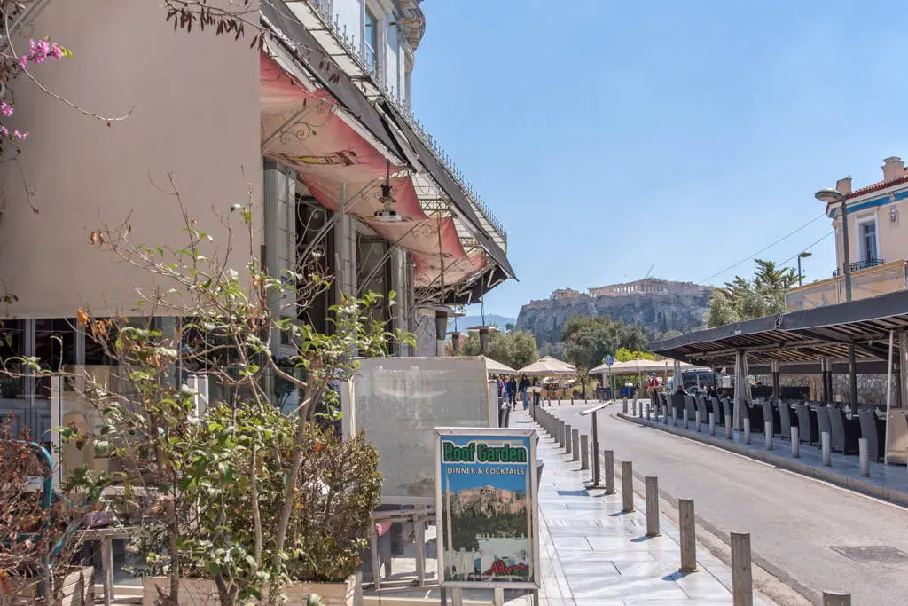 Neoclassical building with rooftop and panoramic landmark views