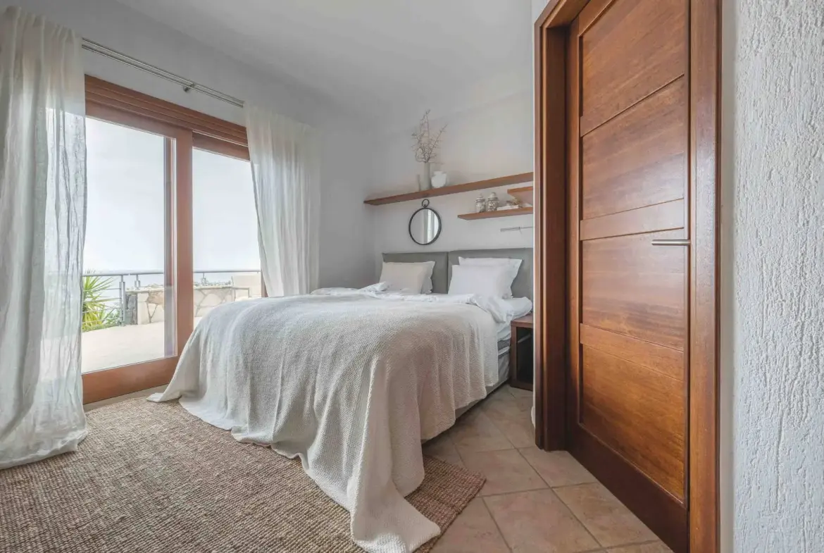 Seafront villa with spa and seafront maisonette with panoramic views in Pera Melana, Arcadia