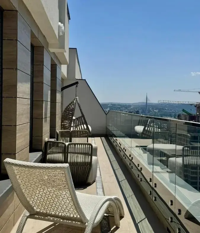Elegant Four-Bedroom Apartment with Panoramic Views in the Wellport Residential Complex