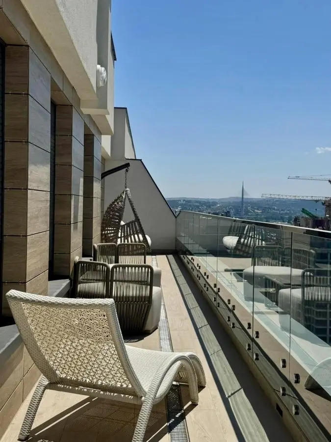 Elegant Four-Bedroom Apartment with Panoramic Views in the Wellport Residential Complex