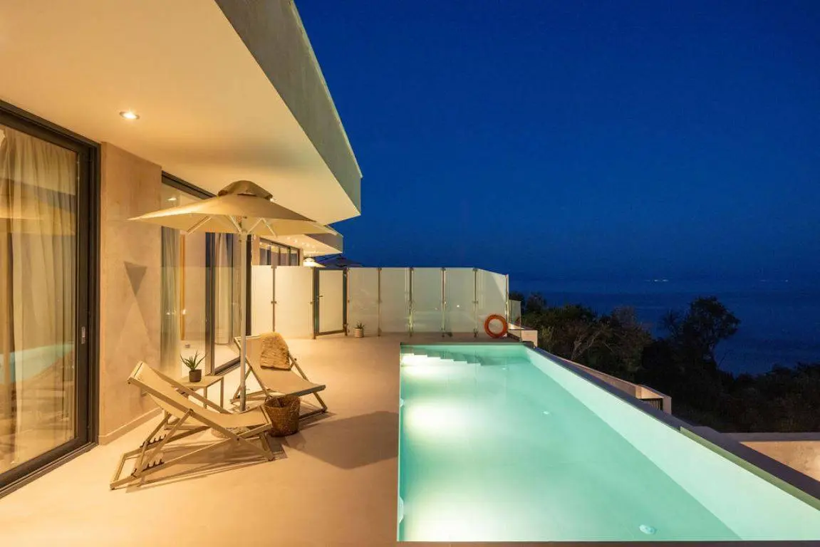 Exclusive earth-sheltered villas with infinity pools & panoramic Ionian Sea view