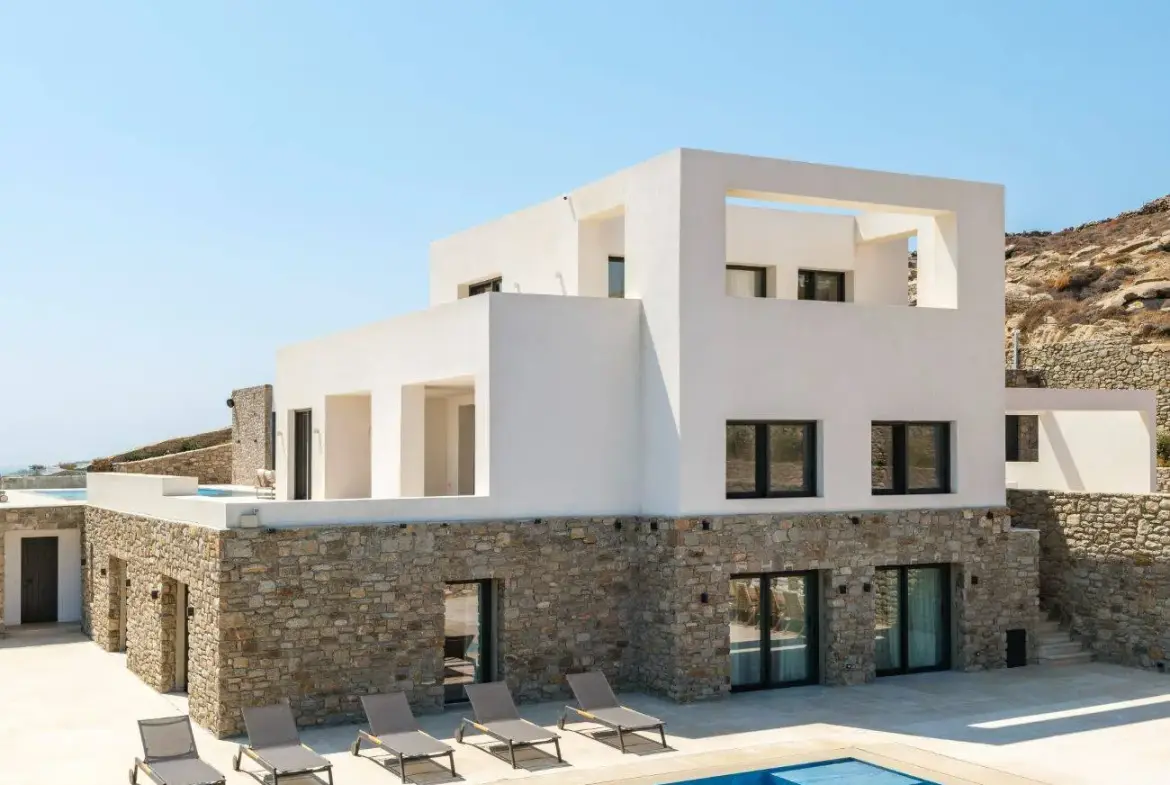 Contemporary ultra-luxury estate in Mykonos with helipad, dual pools & panoramic Aegean views