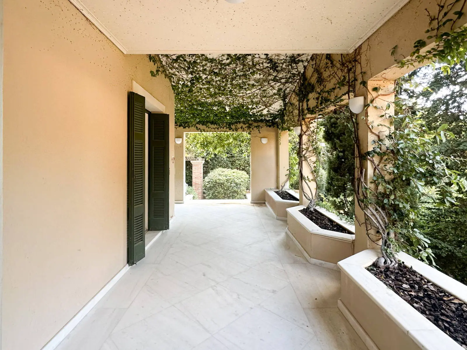 Stylish mansion comprising two residences & a large swimming pool in Nea Erythraia