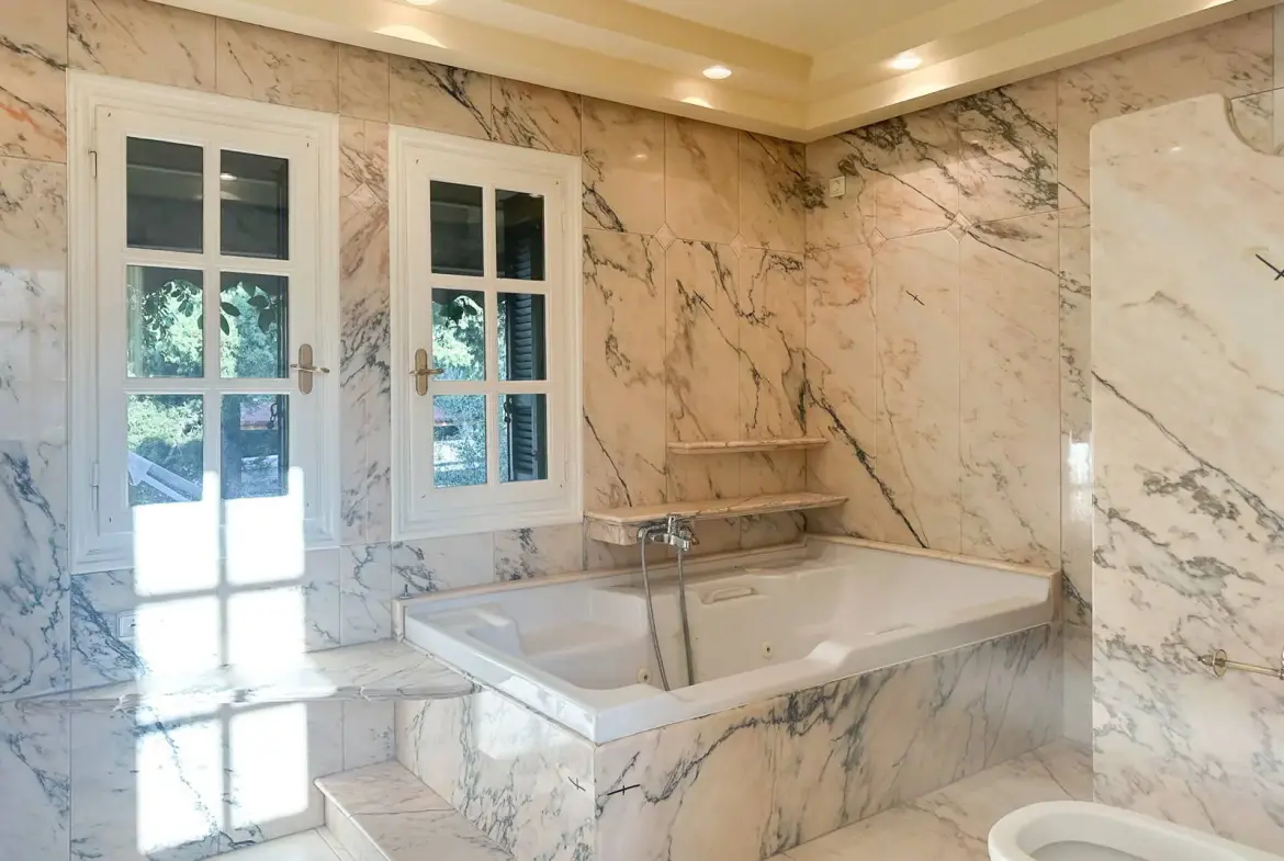 Stylish mansion comprising two residences & a large swimming pool in Nea Erythraia