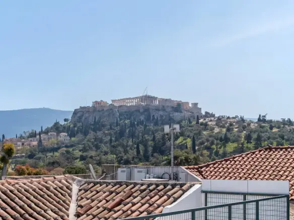 Neoclassical building with rooftop and panoramic landmark views