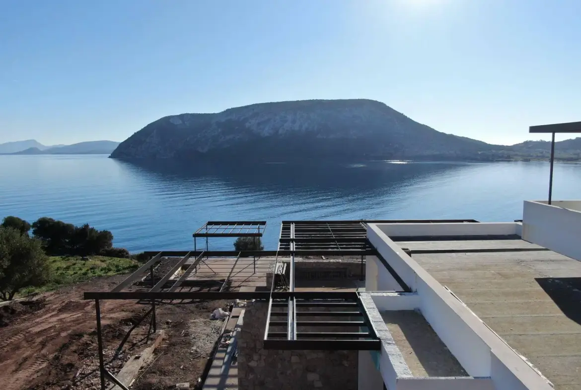 Villa Aeon: Waterfront 425 sq.m. villa with infinity pool and private beach access in Porto Heli