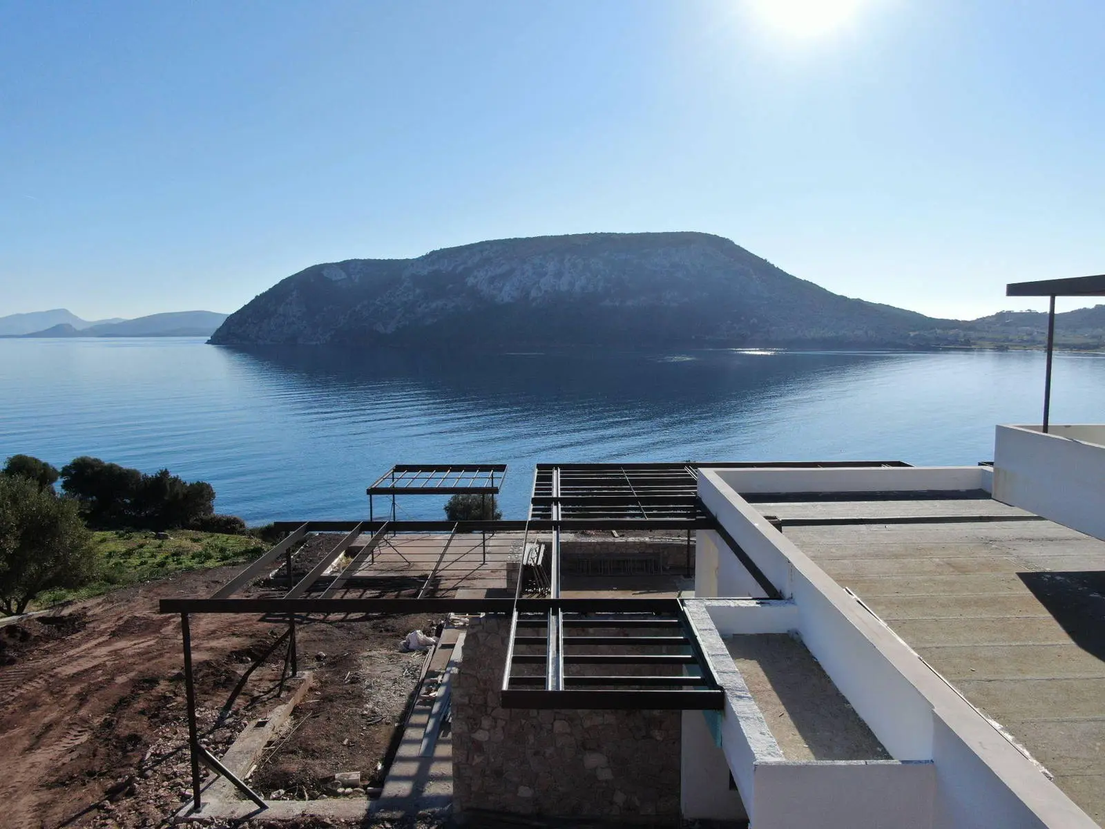 Villa Aeon: Waterfront 425 sq.m. villa with infinity pool and private beach access in Porto Heli