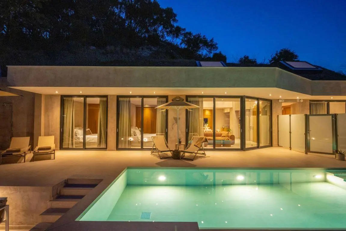 Exclusive earth-sheltered villas with infinity pools & panoramic Ionian Sea view