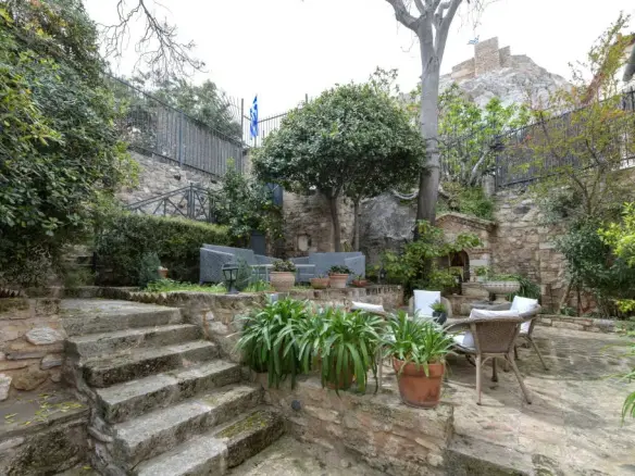 Historic house in Plaka with stunning courtyard and Acropolis view
