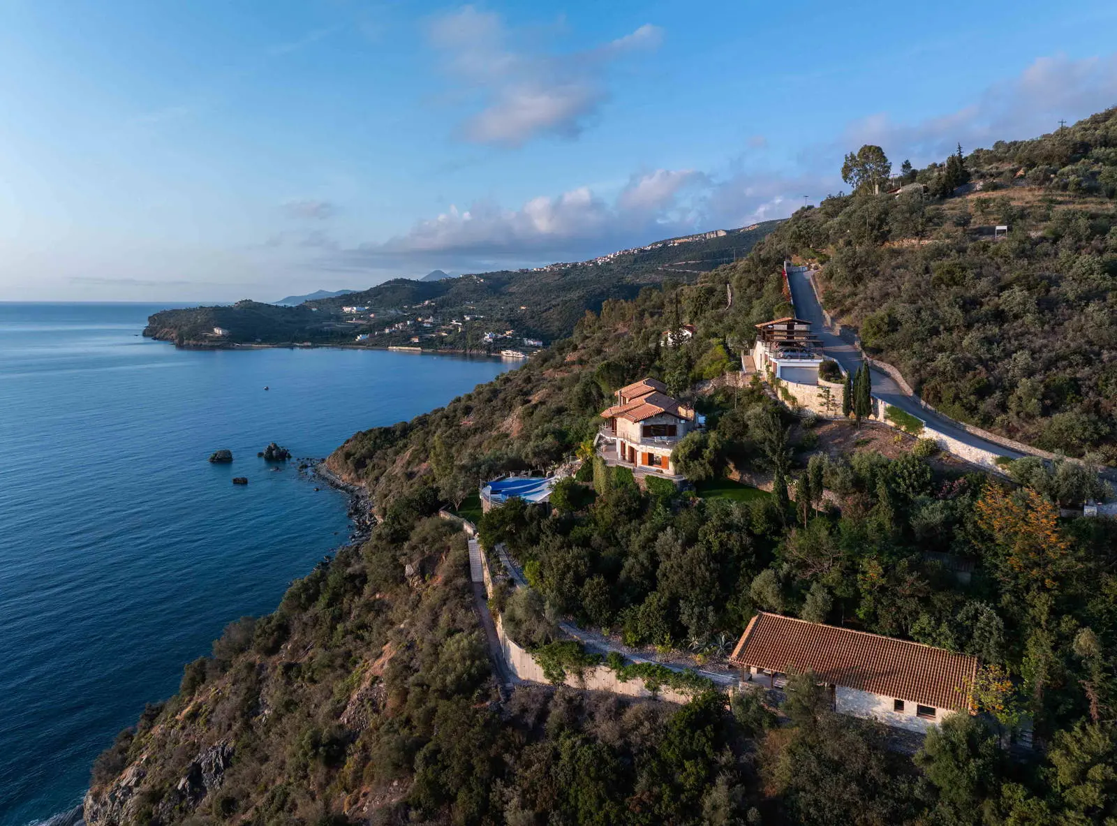 Seafront villa with spa and seafront maisonette with panoramic views in Pera Melana, Arcadia
