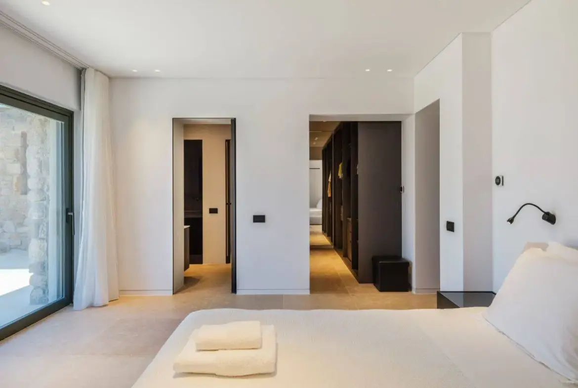 Contemporary ultra-luxury estate in Mykonos with helipad, dual pools & panoramic Aegean views