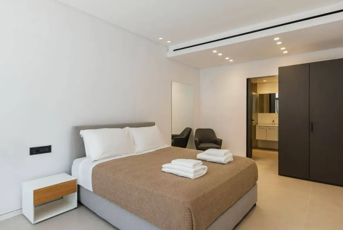 Contemporary ultra-luxury estate in Mykonos with helipad, dual pools & panoramic Aegean views