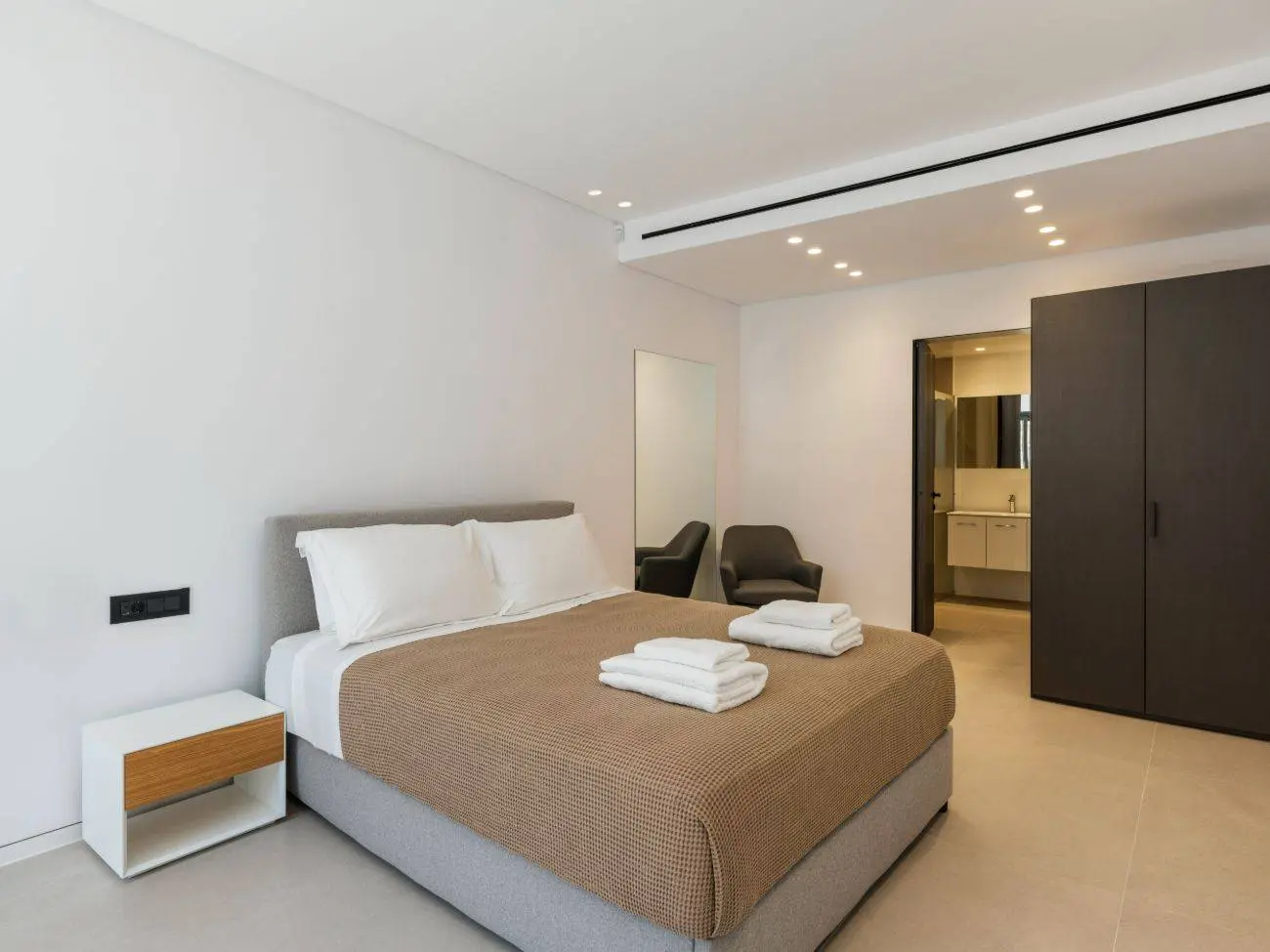 Contemporary ultra-luxury estate in Mykonos with helipad, dual pools & panoramic Aegean views