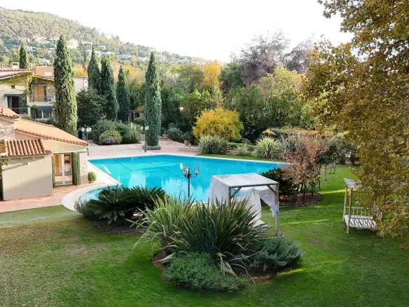 Stylish mansion comprising two residences & a large swimming pool in Nea Erythraia