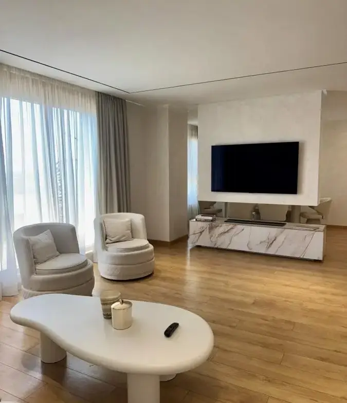 Elegant Four-Bedroom Apartment with Panoramic Views in the Wellport Residential Complex