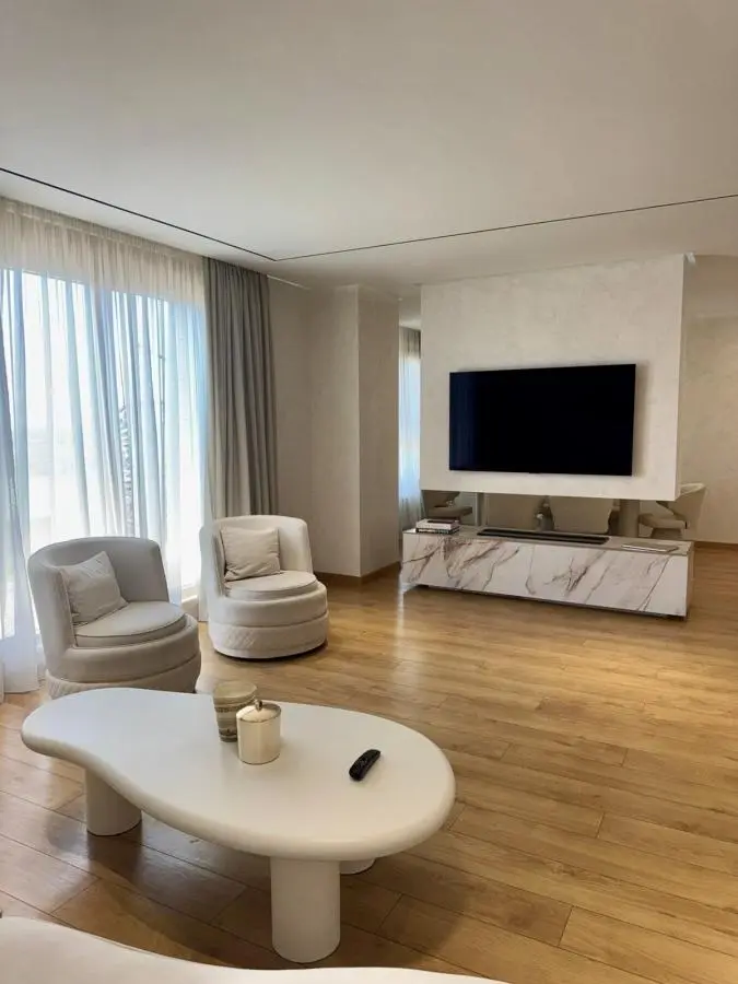 Elegant Four-Bedroom Apartment with Panoramic Views in the Wellport Residential Complex