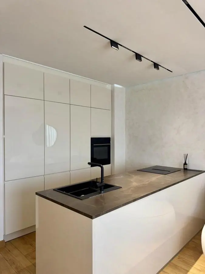 Elegant Four-Bedroom Apartment with Panoramic Views in the Wellport Residential Complex