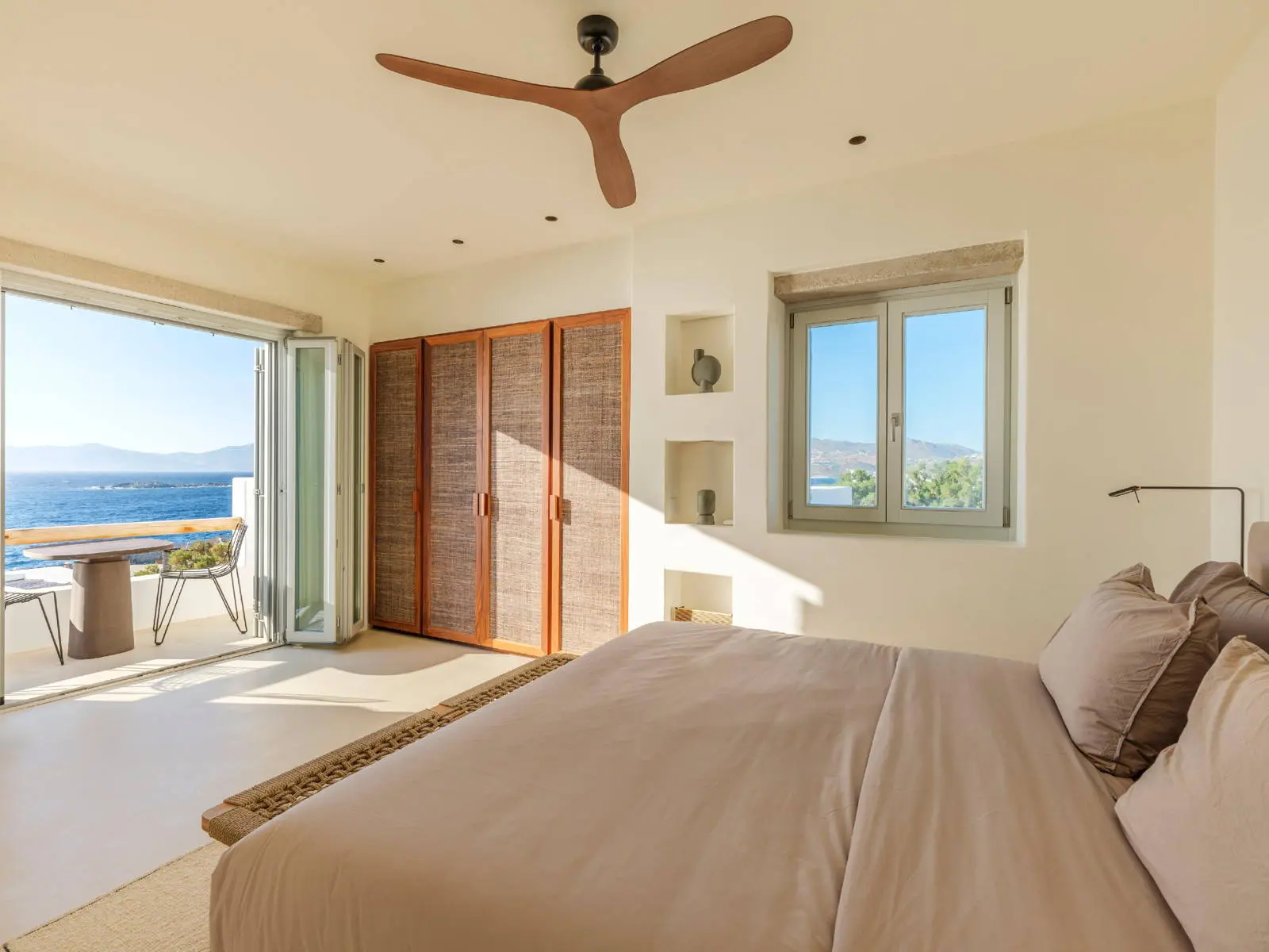 bh-a8dee60c4579 Seafront villa with private beach access and sunset views in Mykonos